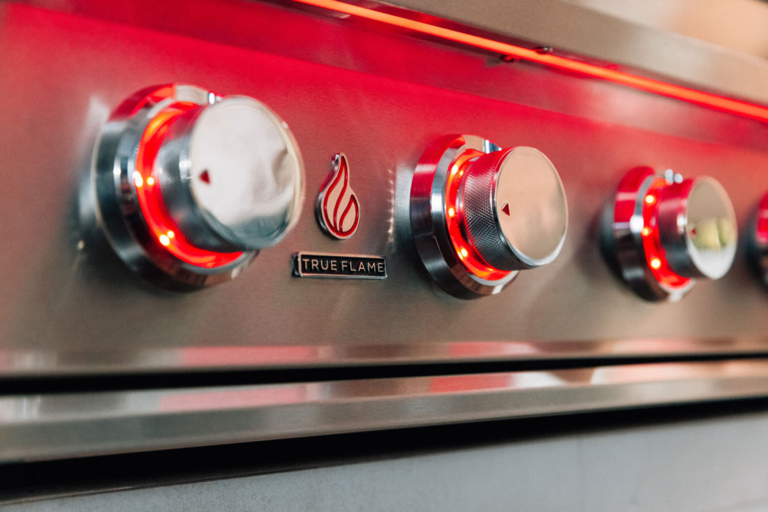 TrueFlame TF40 LED control knobs and illuminated front panel closeup